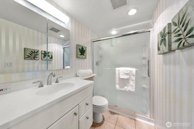 2360 43rd Ave E Unit 213, Seattle, WA 98112 - full bath featuring wallpapered walls, vanity, tile patterned floors, toilet, and a stall shower