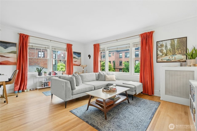 100 W Highland Dr Unit 404, Seattle, WA 98119 - living area with plenty of natural light and light wood-style flooring