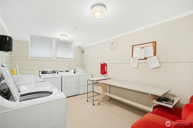 100 W Highland Dr Unit 404, Seattle, WA 98119 - shared laundry room with washing machine and dryer and ornamental molding