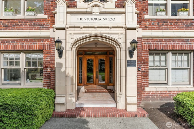 100 W Highland Dr Unit 404, Seattle, WA 98119 - property entrance with french doors and brick siding