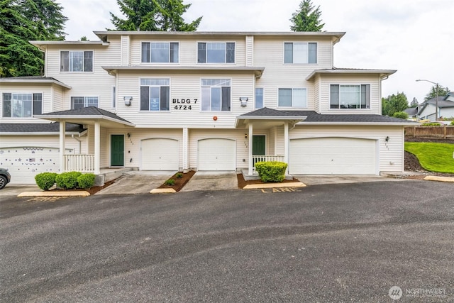 4724 Mill Pond Dr SE Unit 702, Auburn, WA 98092 - view of property featuring a garage