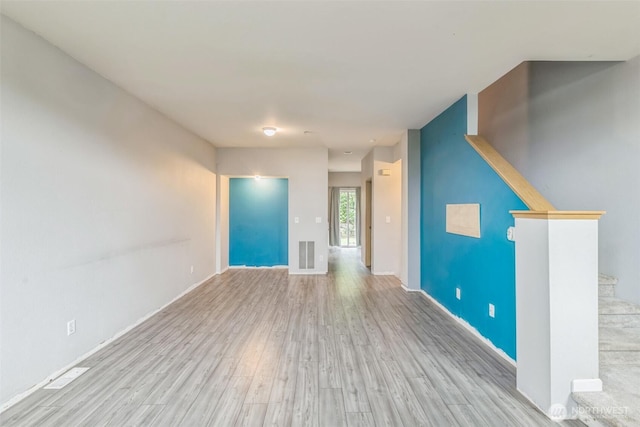 4724 Mill Pond Dr SE Unit 702, Auburn, WA 98092 - unfurnished living room with wood finished floors and baseboards