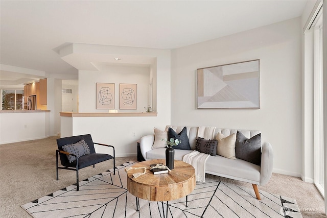 3900 2nd Ave NE Unit 204, Seattle, WA 98105 - living room featuring carpet and baseboards