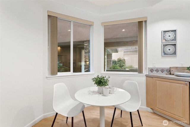 3900 2nd Ave NE Unit 204, Seattle, WA 98105 - dining area with light wood finished floors