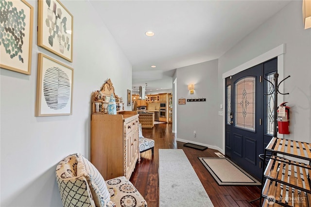 10552 Ski Hill Dr, Leavenworth, WA 98826 - entryway with dark wood finished floors, recessed lighting, and baseboards