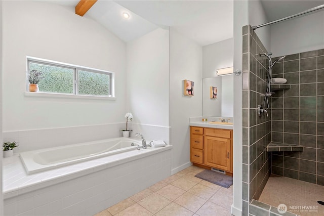 10552 Ski Hill Dr, Leavenworth, WA 98826 - full bath with vanity, a bath, tile patterned flooring, and a tile shower