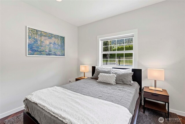 10552 Ski Hill Dr, Leavenworth, WA 98826 - bedroom featuring baseboards and wood finished floors