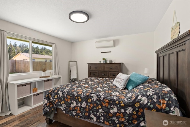 202 Abram Ln, Chehalis, WA 98532 - bedroom with wood finished floors and a wall unit AC