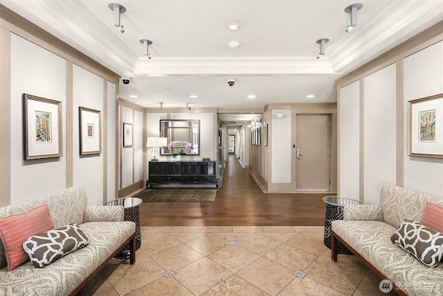 1414 1st Ave W Unit 104, Seattle, WA 98119 - tiled living room featuring ornamental molding, a raised ceiling, and recessed lighting
