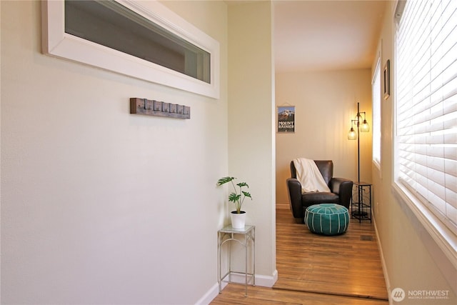 1625 E 61st St, Tacoma, WA 98404 - hallway featuring wood finished floors and baseboards