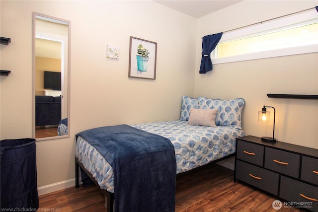 1625 E 61st St, Tacoma, WA 98404 - bedroom featuring dark wood-style flooring and baseboards