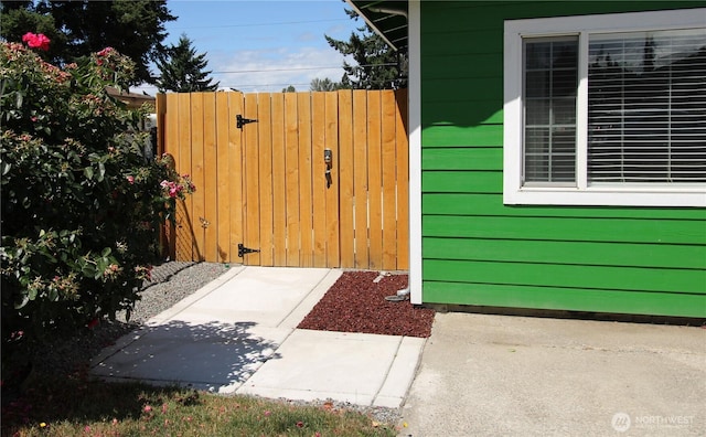 1625 E 61st St, Tacoma, WA 98404 - view of storm shelter featuring a gate