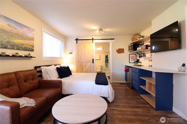 1625 E 61st St, Tacoma, WA 98404 - bedroom with a barn door, dark wood finished floors, ensuite bathroom, and refrigerator