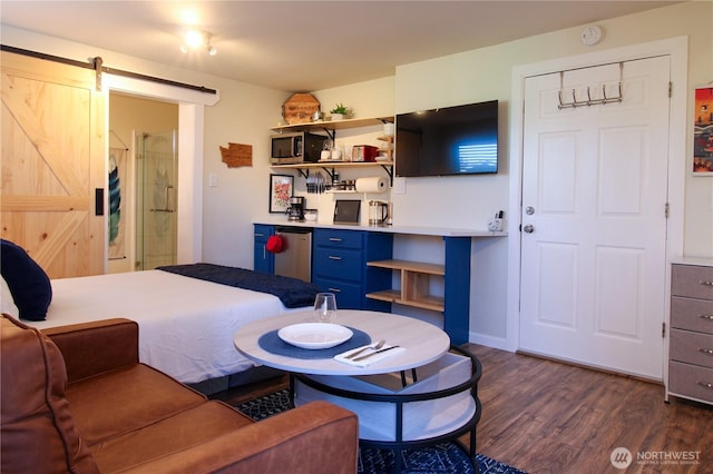 1625 E 61st St, Tacoma, WA 98404 - bedroom with dark wood finished floors, a barn door, and fridge