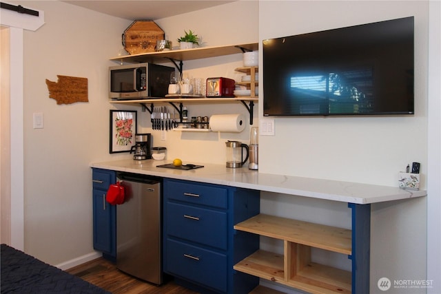 1625 E 61st St, Tacoma, WA 98404 - indoor dry bar featuring fridge, stainless steel microwave, dark wood finished floors, and baseboards