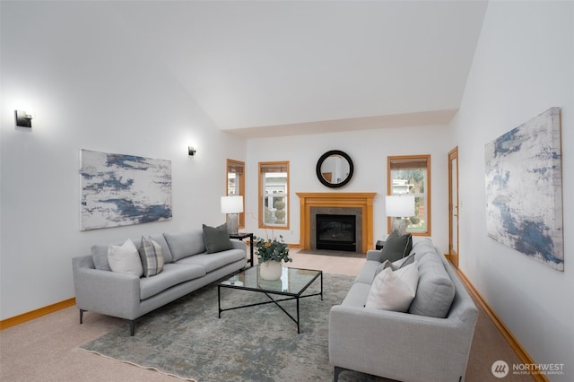 18311 Burn Rd, Arlington, WA 98223 - carpeted living area with lofted ceiling, baseboards, and a fireplace with flush hearth