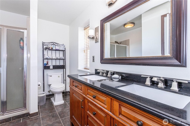37326 19th Pl S, Federal Way, WA 98003 - full bathroom with a stall shower, toilet, tile patterned floors, and double vanity