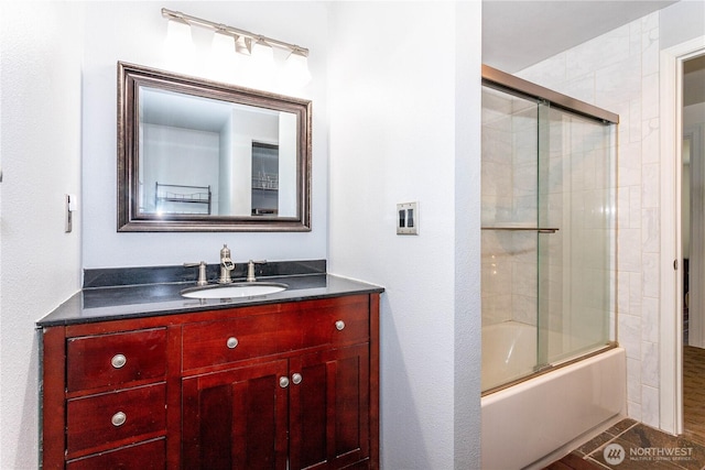 37326 19th Pl S, Federal Way, WA 98003 - bathroom featuring vanity and combined bath / shower with glass door