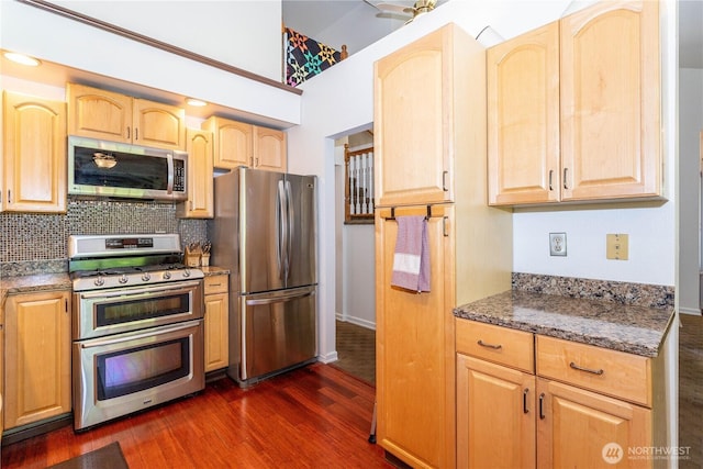 37326 19th Pl S, Federal Way, WA 98003 - kitchen with appliances with stainless steel finishes, dark wood-type flooring, light brown cabinetry, and vaulted ceiling