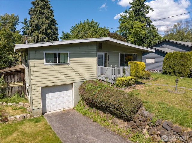 2134 SW 339th St, Federal Way, WA 98023 - view of front of house with a garage, asphalt driveway, and a front yard