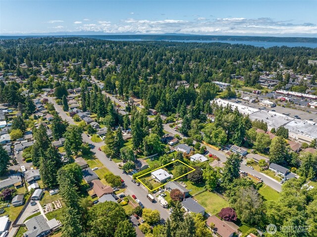 2134 SW 339th St, Federal Way, WA 98023 - aerial view of property and surrounding area with a forest, property boundaries highlighted, and a large body of water