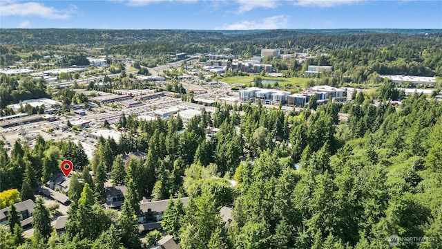 12721 NE 116th St Unit F102, Kirkland, WA 98034 - aerial view of property and surrounding area with a forest