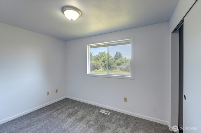 2320 183rd Street Ct E, Tacoma, WA 98445 - empty room with baseboards and dark carpet