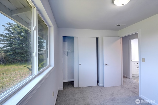2320 183rd Street Ct E, Tacoma, WA 98445 - unfurnished bedroom with carpet floors, a closet, and baseboards
