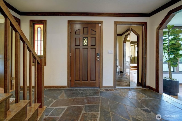 2120 Squak Mountain Loop SW, Issaquah, WA 98027 - entryway with stone tile flooring, stairs, baseboards, and crown molding