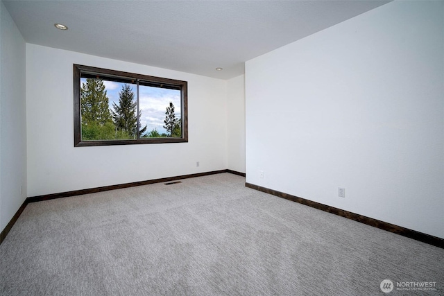 2120 Squak Mountain Loop SW, Issaquah, WA 98027 - spare room with carpet floors, baseboards, and recessed lighting