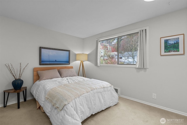 4222 Beach Dr SW Unit 303, Seattle, WA 98116 - bedroom with carpet and baseboards