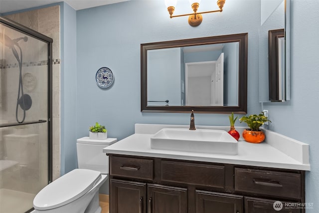 4222 Beach Dr SW Unit 303, Seattle, WA 98116 - bathroom with vanity, toilet, and a shower stall