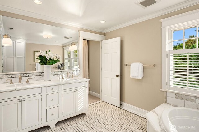 1325 Broadmoor Dr E, Seattle, WA 98112 - bathroom featuring double vanity, a tub, baseboards, crown molding, and recessed lighting