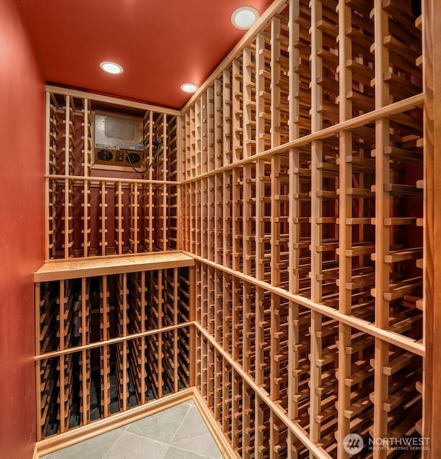 1325 Broadmoor Dr E, Seattle, WA 98112 - wine area with recessed lighting and tile patterned flooring