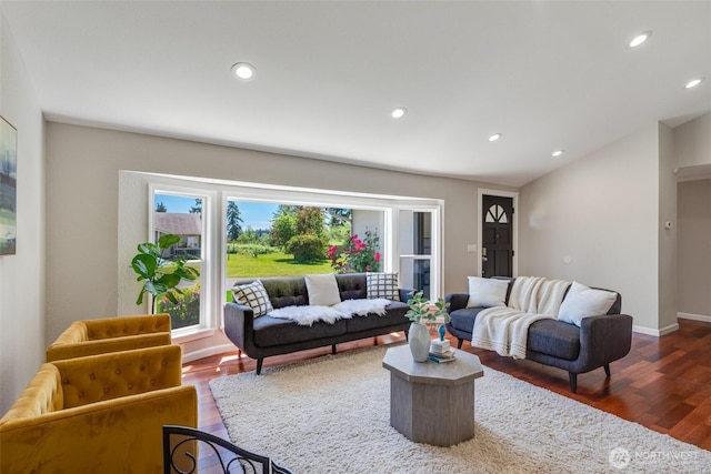 8048 S Ainsworth Ave, Tacoma, WA 98408 - living room featuring wood finished floors, lofted ceiling, recessed lighting, and baseboards