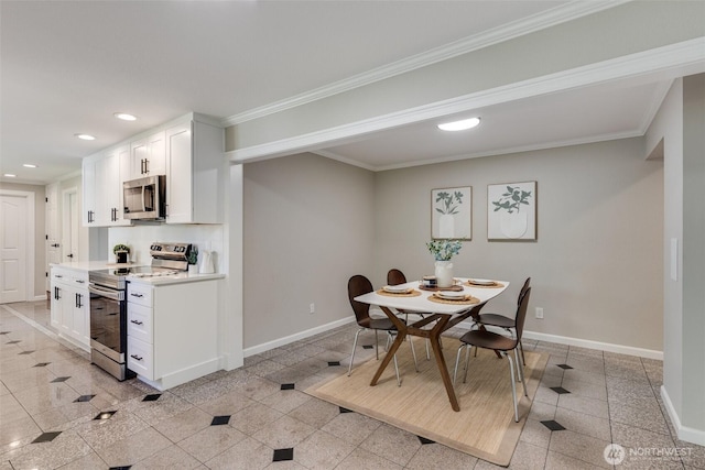 8048 S Ainsworth Ave, Tacoma, WA 98408 - dining room with granite floors, baseboards, recessed lighting, and ornamental molding