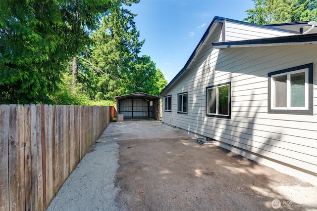 8048 S Ainsworth Ave, Tacoma, WA 98408 - view of property exterior with a carport