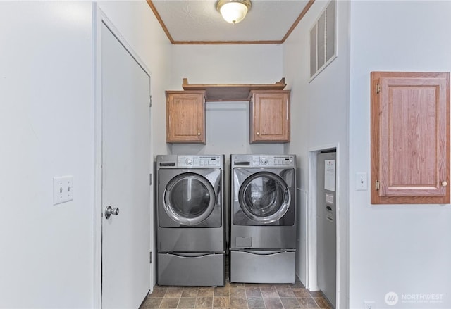 8530 Steilacoom Rd SE Unit 113, Olympia, WA 98513 - washroom with independent washer and dryer, cabinet space, and crown molding