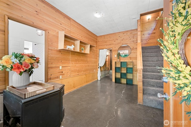 22 Bramble Way, Bellingham, WA 98229 - foyer entrance with wood walls, concrete flooring, and stairway
