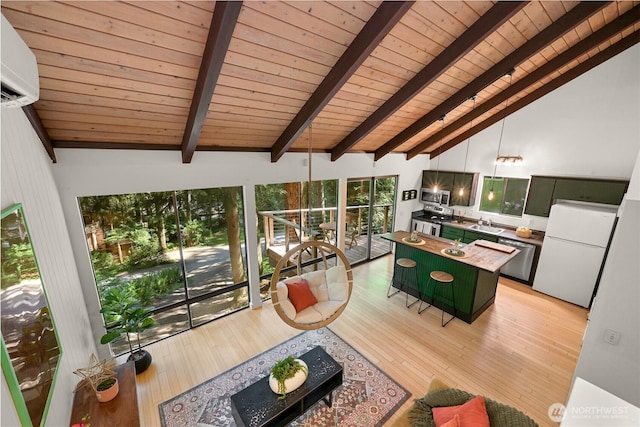 22 Bramble Way, Bellingham, WA 98229 - living room featuring a wooden ceiling with exposed beams, a wall mounted AC, light wood-style floors, and high vaulted ceiling
