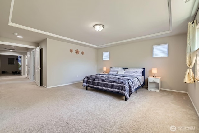 12726 36th Pl NE, Lake Stevens, WA 98258 - bedroom featuring light carpet, baseboards, and a tray ceiling