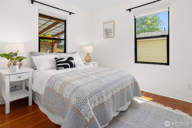 4742 22nd Ave SW, Seattle, WA 98106 - bedroom featuring wood finished floors and baseboards
