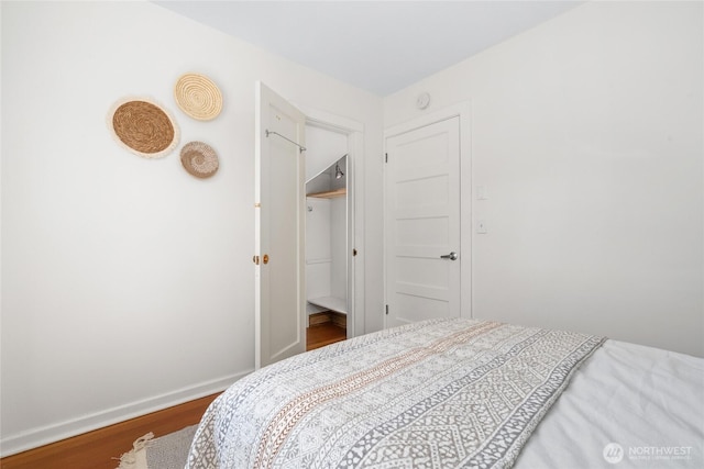 4742 22nd Ave SW, Seattle, WA 98106 - bedroom featuring wood finished floors and baseboards