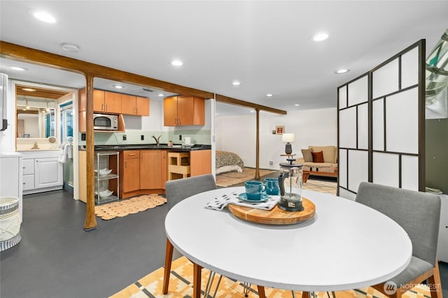 4742 22nd Ave SW, Seattle, WA 98106 - dining room with finished concrete floors and recessed lighting