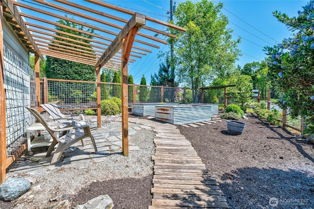 4742 22nd Ave SW, Seattle, WA 98106 - view of yard featuring a vegetable garden and a pergola