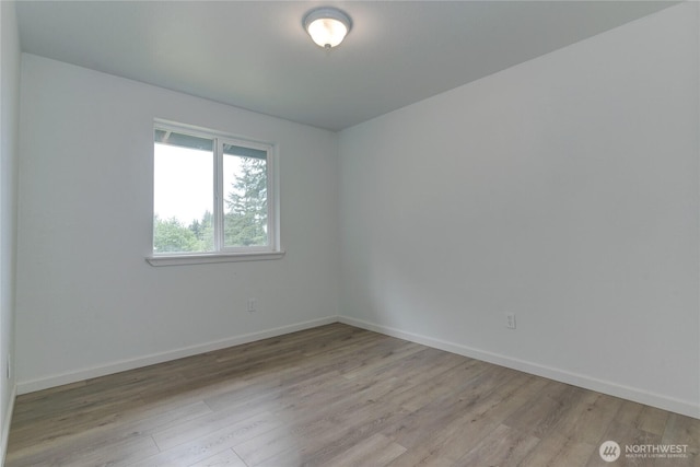 2539 123rd Ave SW, Olympia, WA 98512 - unfurnished room featuring light wood finished floors and baseboards