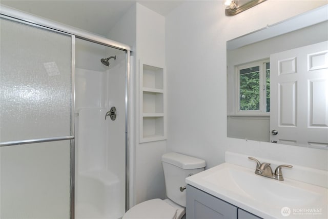 2539 123rd Ave SW, Olympia, WA 98512 - bathroom featuring an enclosed shower, vanity, and toilet