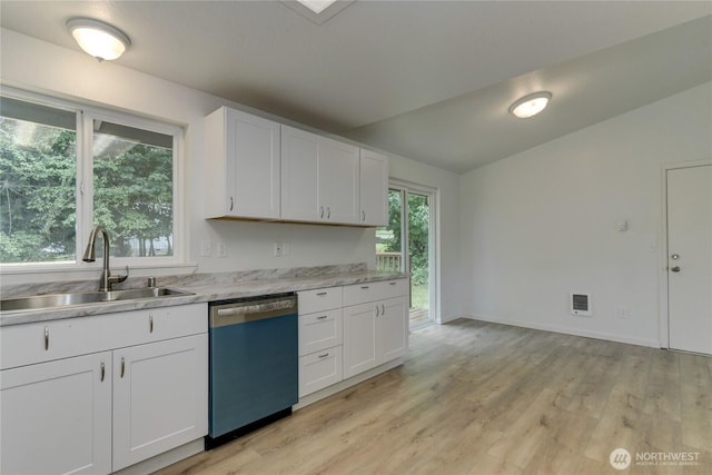 2539 123rd Ave SW, Olympia, WA 98512 - kitchen with dishwasher, a sink, light countertops, white cabinets, and light wood-type flooring