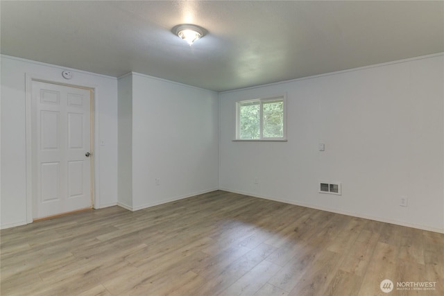 2539 123rd Ave SW, Olympia, WA 98512 - unfurnished room featuring light wood-style flooring and baseboards