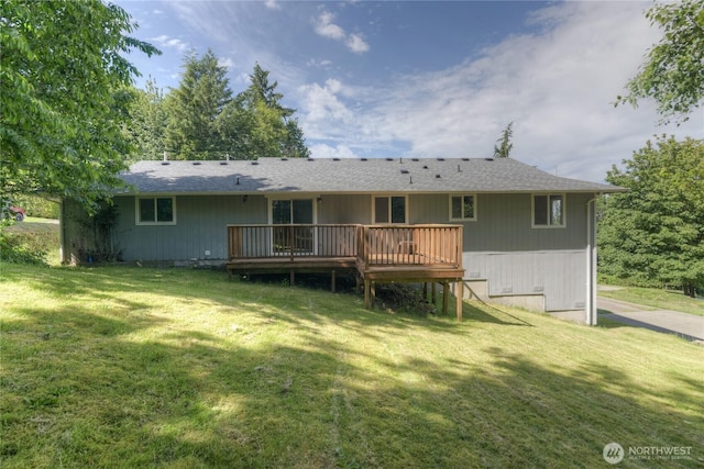 2539 123rd Ave SW, Olympia, WA 98512 - back of house with a deck and a lawn